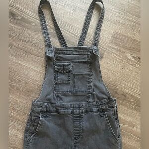 Free People washed black skinny overalls size 27